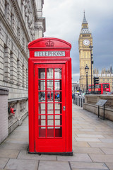 Big ben and red phone cabin in London