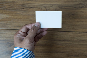 Obraz premium Hand hold blank white card mockup Business branding.
