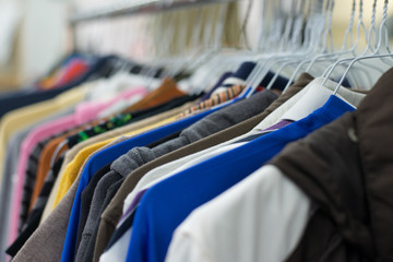 shirts hanging on a hanger.Colorful T Shirt