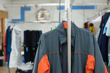 shirts hanging on a hanger.Colorful T Shirt