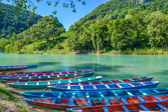 Colorful canoes in Tamul river at Huasteca Potosina, Mexico
