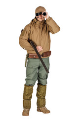 Full length portrait of a male hunter  looking through binoculars Isolated on white background. hunting and people concept.