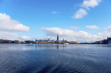 Fototapeta premium A snowy, cold and sunny view of Riddarholmen, The Knights' Islet, Stockholm