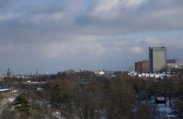 Fototapeta na wymiar A snowy, cold and sunny view of the island Kungsholmen in Stockholm