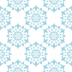 Blue floral ornament on white background. Seamless pattern