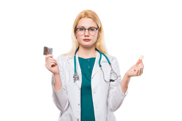 Woman doctor with stethoscope hold condom