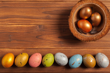 Happy easter! Easter eggs on wooden background