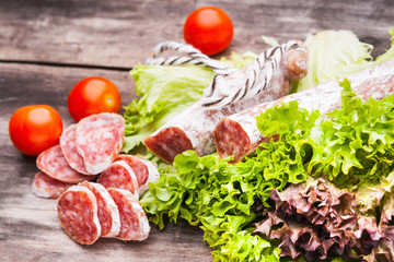 Sausage salami with noble mold and vegetables 