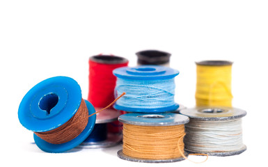 spool of thread on white background