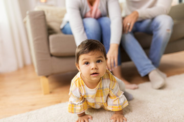 little baby girl on floor at home