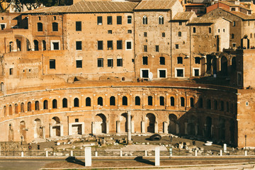 People are Visiting The Imperial Fora.  The Imperial Fora are a series of monumental fora, constructed in Rome.