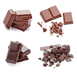 close up of chocolate pieces on  wooden background