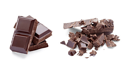 close up of chocolate pieces on  wooden background