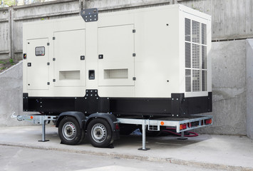 Standby generator. Industrial Power Diesel Generator Caravan.  Backup Generator Power.