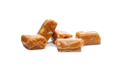 Caramels, pieces isolated on white background