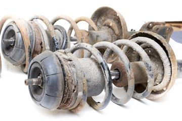 Old, dirty shock absorber, car suspension parts