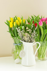 catkins in pot with easter eggs