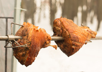 frying meat on a spit
