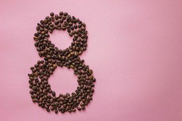 figure 8 from coffee beans on a bright lilac background and plenty of space for text vertical 