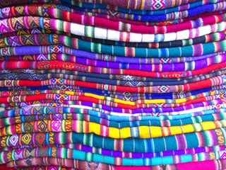 Andean blankets in a street market, La Paz, Bolivia. The photo works as a background. Andean...