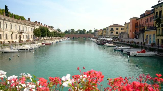 Port of Peschiera del Garda - town and commune near Venice , Italy .