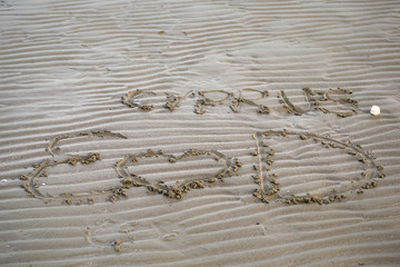 letters on sand Cyprus