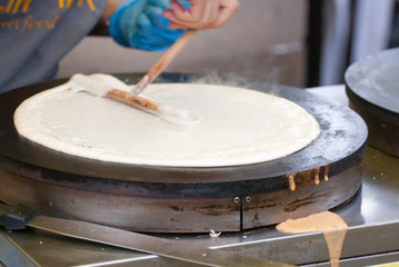 Waffle or crepe is pancake batter baked in a waffle iron.Method thin cake baked and then rolled at homemade bakery restaurant.