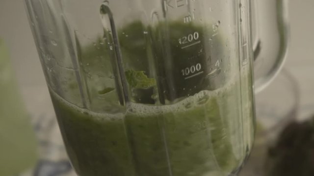 Slow motion green juice