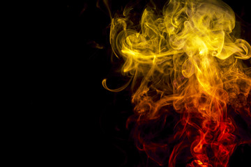 Colored smoke on black background