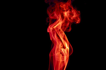 Obraz premium Red smoke on black background