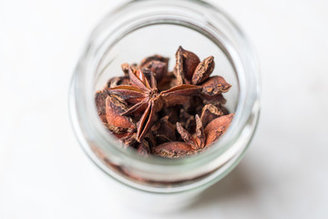Star Anise Spice Fruits and Seeds in a Jar.