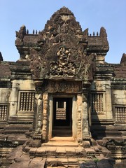Naklejka premium Angkor Wat in Siem Reap, Cambodia. Ancient Khmer stone temple ruins in jungle forest