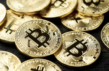 Closeup of bitcoins on black background