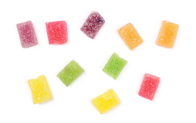 Colorful jelly sugar candies isolated on white background, top view