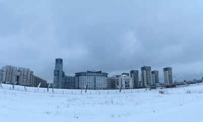 Fototapeta premium panorama of the residential quarter on the outskirts of the city on a winter evening
