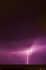 Naklejka na ściany i meble Lightning during a night thunderstorm