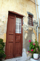 Front view of an old house in Ano Syros town, Syros island, Cyclades, Greece.