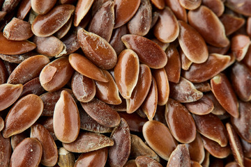 Close-up selective focus healthy flax seed background, macro.