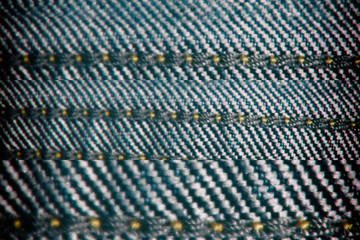 Naklejka premium Denim texture with beige seam for jeans background