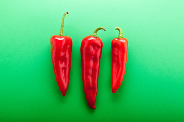 Top view of vegetables on green background in studio photo