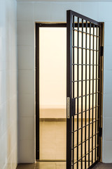 prison bars and empty prison room