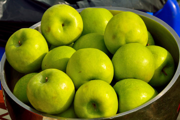 Still life with green apples.