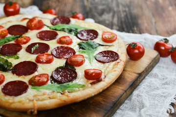 Tasty Pizza With Tomato Sauce, Pepperoni Sausage, And Mushrooms On Wooden Background Natural Rustic, A Pizza Cutter And Ingridienty.