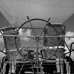 One metal steering wheel the boat