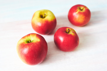 apples on a white wooden table