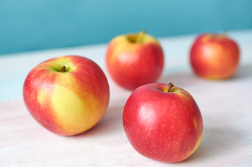 apples on a white wooden table
