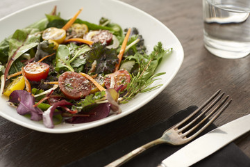 fresh salad on brown table