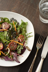 fresh salad on brown table