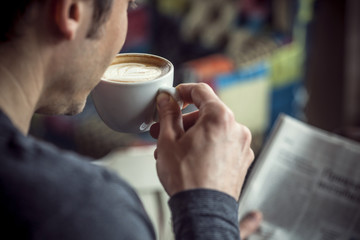 Drinking espresso