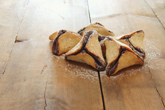 Purim celebration concept (jewish carnival holiday). Traditional hamantaschen cookies.